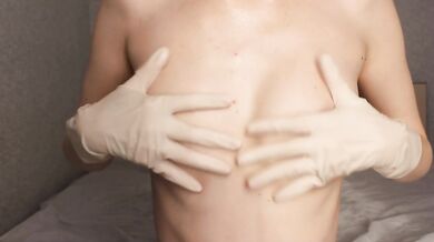 OILED TITS MASSAGED IN MEDICAL LATEX GLOVES SMALL TITS FETISH NIPPLES CLOSE UP