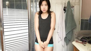 Asian Girl Wets Her Shorts