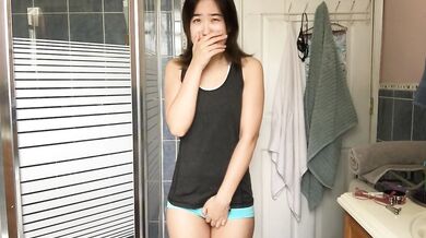 Asian Girl Wets Her Shorts