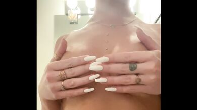Watch me rub oil all over my titties & play with my pierced nipples