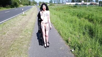 Slut Lucy Ravenblood walking nude at a public road