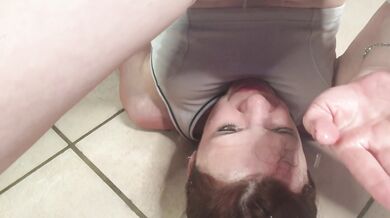 Flexible petite girl pissing through white pants into her mouth