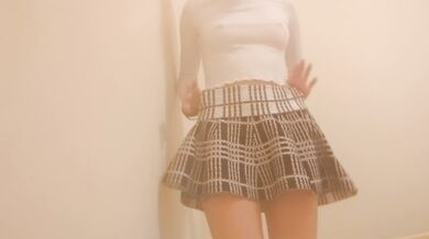 Petite short haired girl dances and strips in front of camera