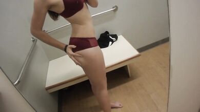 Horny teen having fun in dressing room preview