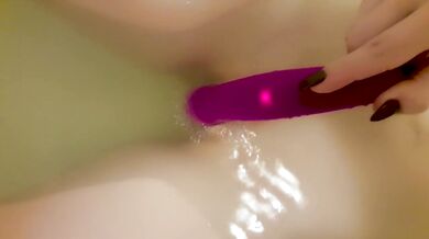 Playing with strapon in the bathroom - clitoral orgasm close up