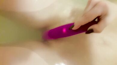 Playing with strapon in the bathroom - clitoral orgasm close up