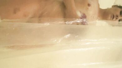 amateur babe- perky tits and big ass. shower with soapy cock tease.