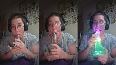 Watch me suck my light up Dildo