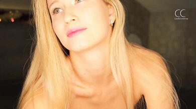 a romantic setting and a blonde spreading her legs