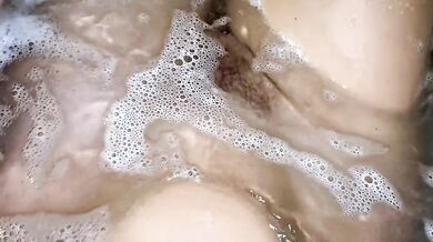 Relaxing time out in the bathtub with my hairy pussy