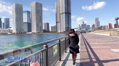 A beautiful woman who walks around the city naked in the middle of winter with just a coat