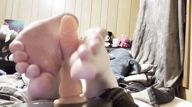 cute 18 year old gives you a footjob