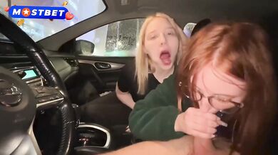 Double blowjob in the car before real sex in a public cinema
