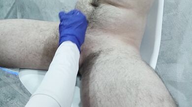 The nurse thoroughly massaged the patient's testicles and penis to collect sperm for analysis.