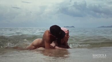 Hot & risky sex in the sea waves on the beach