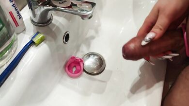 Femdom. Mommy removes the cage from her stepson's penis, lets him pee and washes him in the shower.