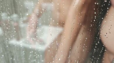 Femdom. Mommy removes the cage from her stepson's penis, lets him pee and washes him in the shower.