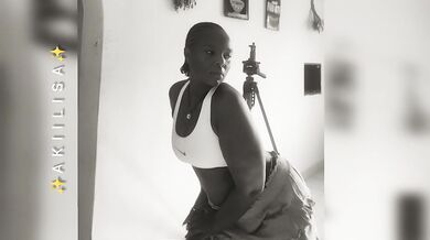 Curvy Girl Dancing Alone at Home (B&W)
