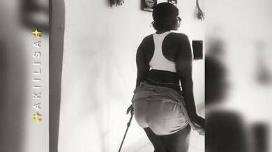 Curvy Girl Dancing Alone at Home (B&W)