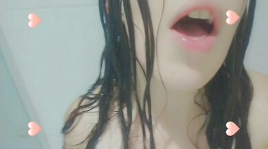 Naughty girl taking a hot shower and getting horny ending up masturbation at shower , mouth close up