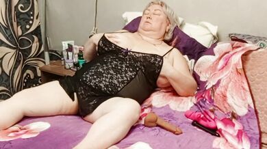mother-in-law masturbates her juicy, fleshy pussy