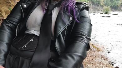 Milf fucks herself with huge dildo beside public river