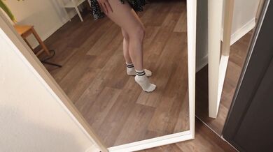 Horny girl films herself and masturbates in front of the mirror