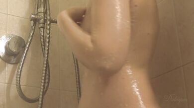Lily takes a hot shower