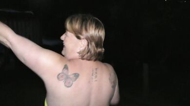 Very public walk with bright lights tail butt plug at the beach. We talk to passers by