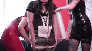 Boot fetish, dick bougie, cling film, spanking, tickling for a maid from two Mistresses. Femdom BDSM