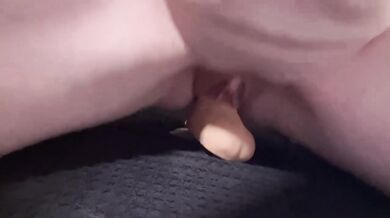 Bisexual female fucks dildo