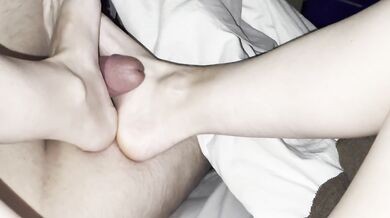 He fucks my tiny feet hard, after 8 minutes of me massaging his cock with my feet. Then gushes cum for me!