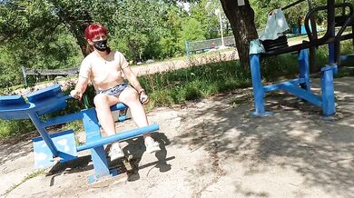 Risky workout in a public park: tiny skirt and no panties