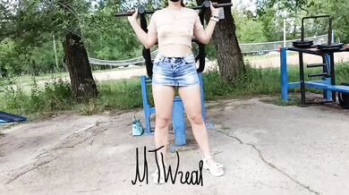 Risky workout in a public park: tiny skirt and no panties