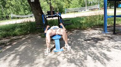 Risky workout in a public park: tiny skirt and no panties