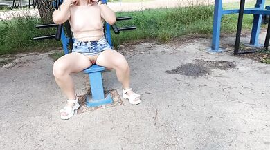 Risky workout in a public park: tiny skirt and no panties