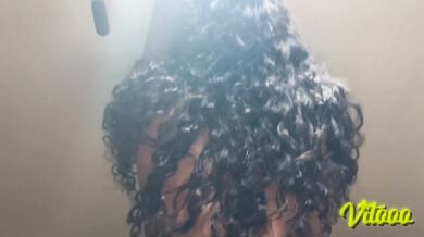A submissive woman with black hair is penetrated