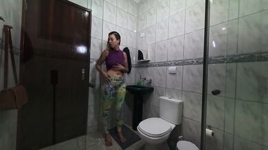 Me arriving at work and changing clothes in the bathroom.