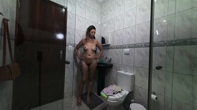 Me arriving at work and changing clothes in the bathroom.