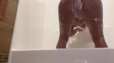 Massive ass hums beneath glistening dildo during private ritual