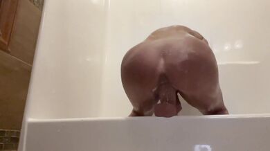 Massive ass hums beneath glistening dildo during private ritual
