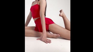 yoga in short red skirt