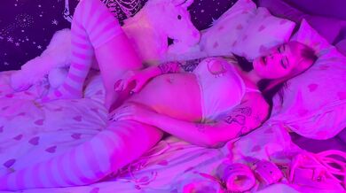 Petite goth girl plays with pink dildo