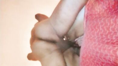At the edge of the bed, his big cock slides into her big pussy.