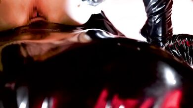 A woman having video sex in latex maid cosplay!