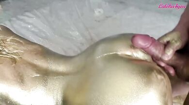 Sexy blonde makes a golden body art and fucks with a neighbor