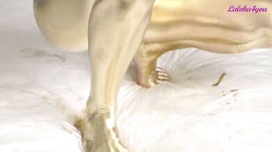 Sexy blonde makes a golden body art and fucks with a neighbor