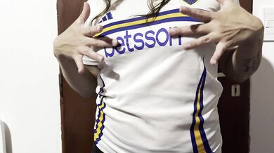 Getting warmed up before the football match... female fan undressing...