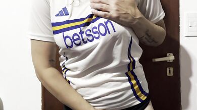 Getting warmed up before the football match... female fan undressing...