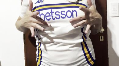 Getting warmed up before the football match... female fan undressing...